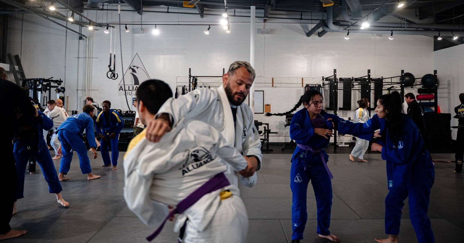 A gi class working stand-up at Alliance Jiu Jitsu San Diego